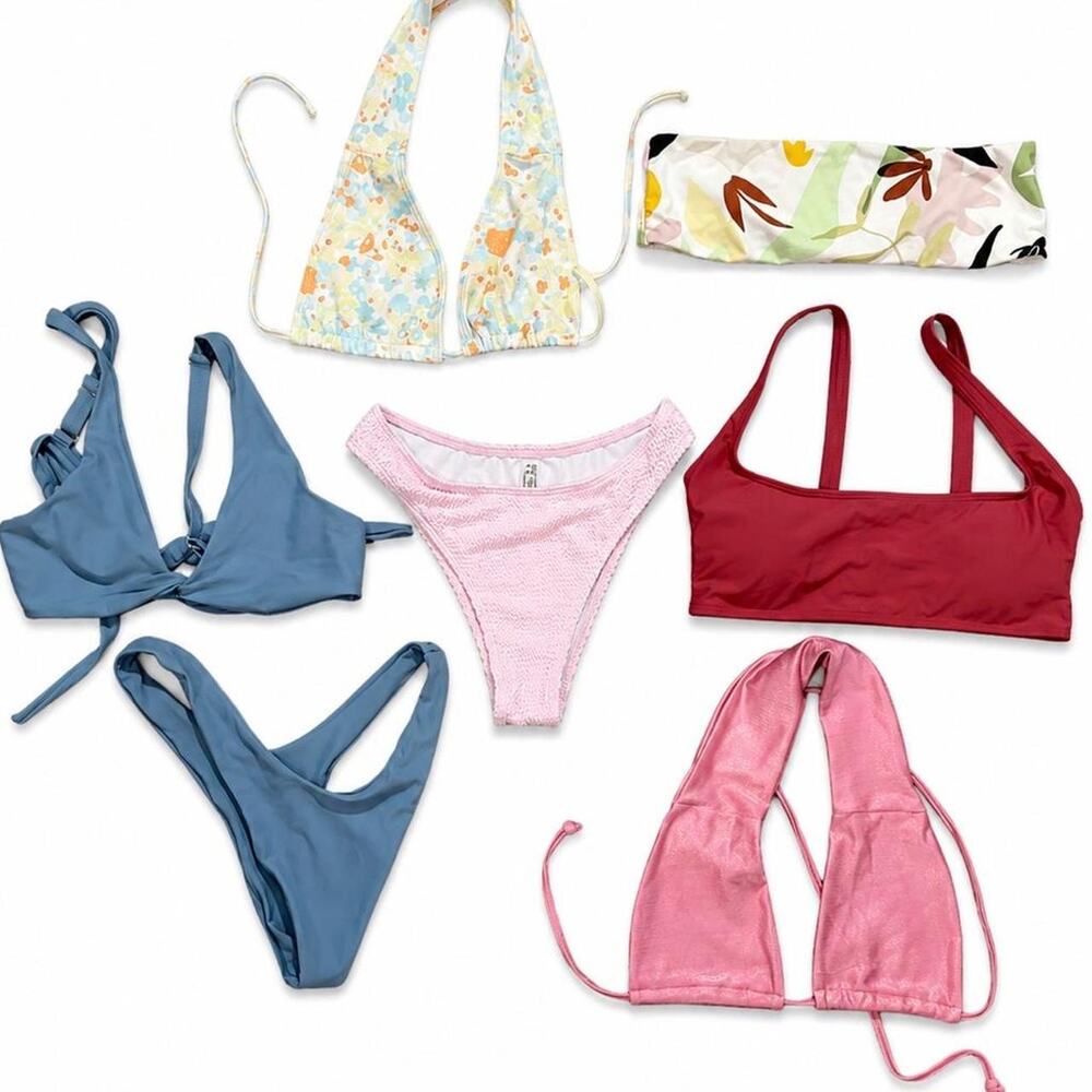 Lot of multiple  bikini tops and bottoms… you get all shown